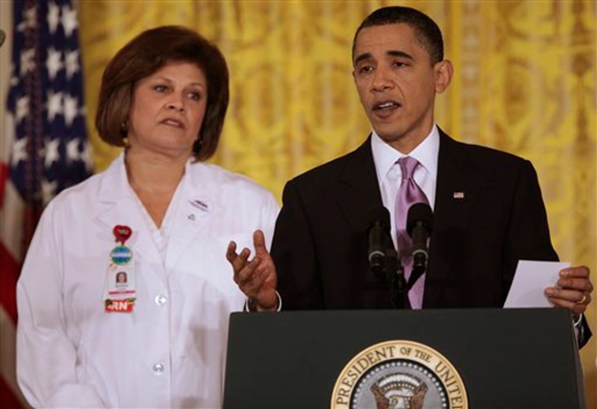 President Barack Obama, accompanied by registered nurse Barbara Crane, speaks about health care reform, Wednesday, March 3, 2010, in the East Room of the White House in Washington. (AP Photo/Charles Dharapak) (AP)