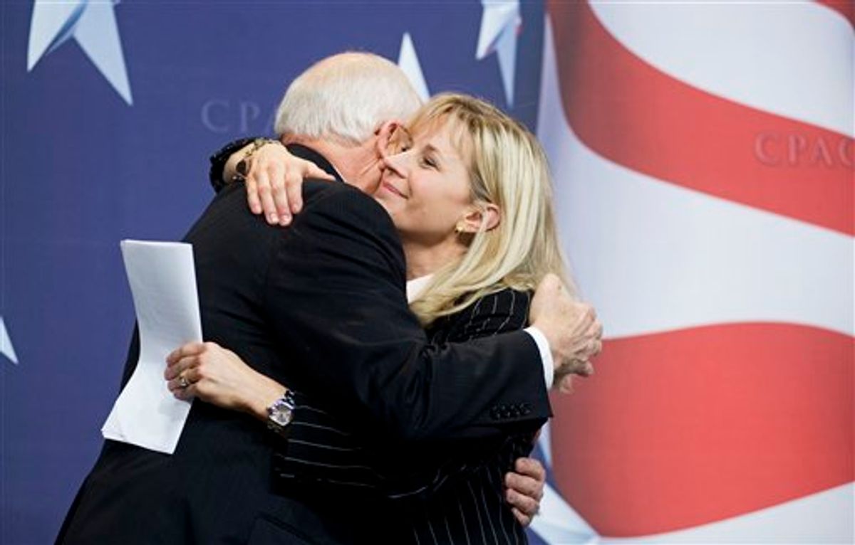 Former Vice President Dick Cheney hugs his daughter, Liz Cheney, after she surprised the Conservative Political Action Conference (CPAC) by bringing him as her guest, Thursday, Feb. 18, 2010, in Washington. (AP Photo/Cliff Owen)   (AP)