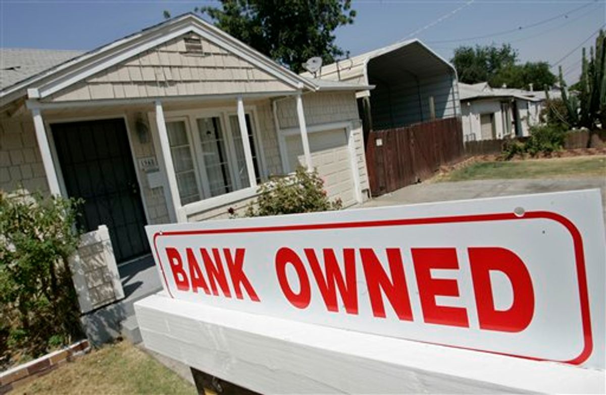 FILE - In this Aug. 14, 2008 file phtoo, a sign is posted outside a foreclosed house in Antioch, Calif. (AP Photo/Paul Sakuma, File) (AP)