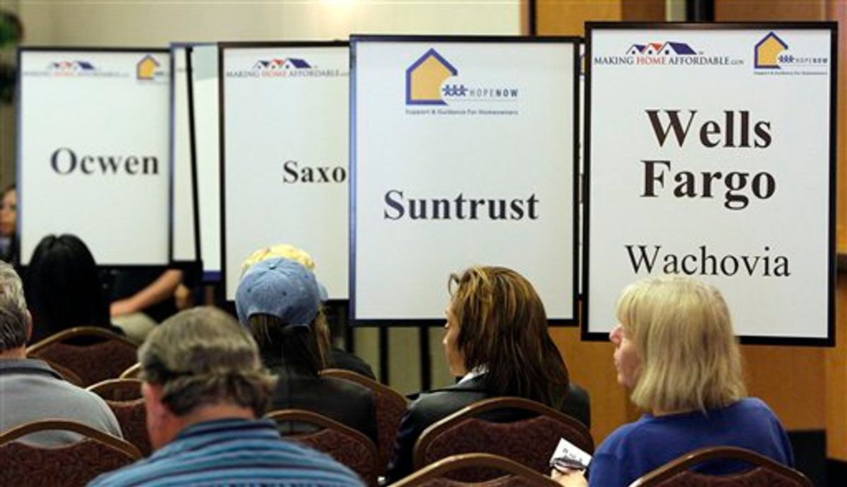 Hundreds of Arizona homeowners came to meet with housing counselors and representatives from major lenaders, Thursday, March 11, 2010, in Glendale, Ariz. The outreach event was organized by federal agencies under the Obama Administration's Making Home Affordable program. (AP Photo/Ross D. Franklin) (AP)