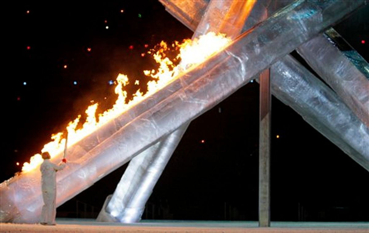 Canadian speed skater Catriona Le May Doan lights the Olympic Cauldron during the closing ceremony for the Vancouver 2010 Olympics in Vancouver, British Columbia, Sunday, Feb. 28, 2010. (AP Photo/Jae C. Hong) (AP)