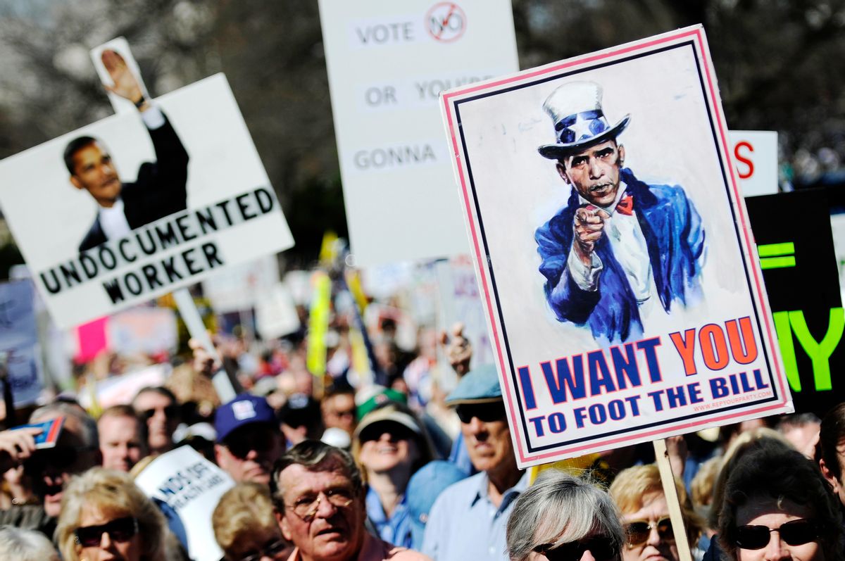 Protestors hold signs during a 'Kill the Bill' rally against President Barack Obama's health care legislation, on the west front of the U.S. Capitol in Washington, March 20, 2010. REUTERS/Jonathan Ernst    (UNITED STATES - Tags: POLITICS CIVIL UNREST HEALTH)   (Reuters)