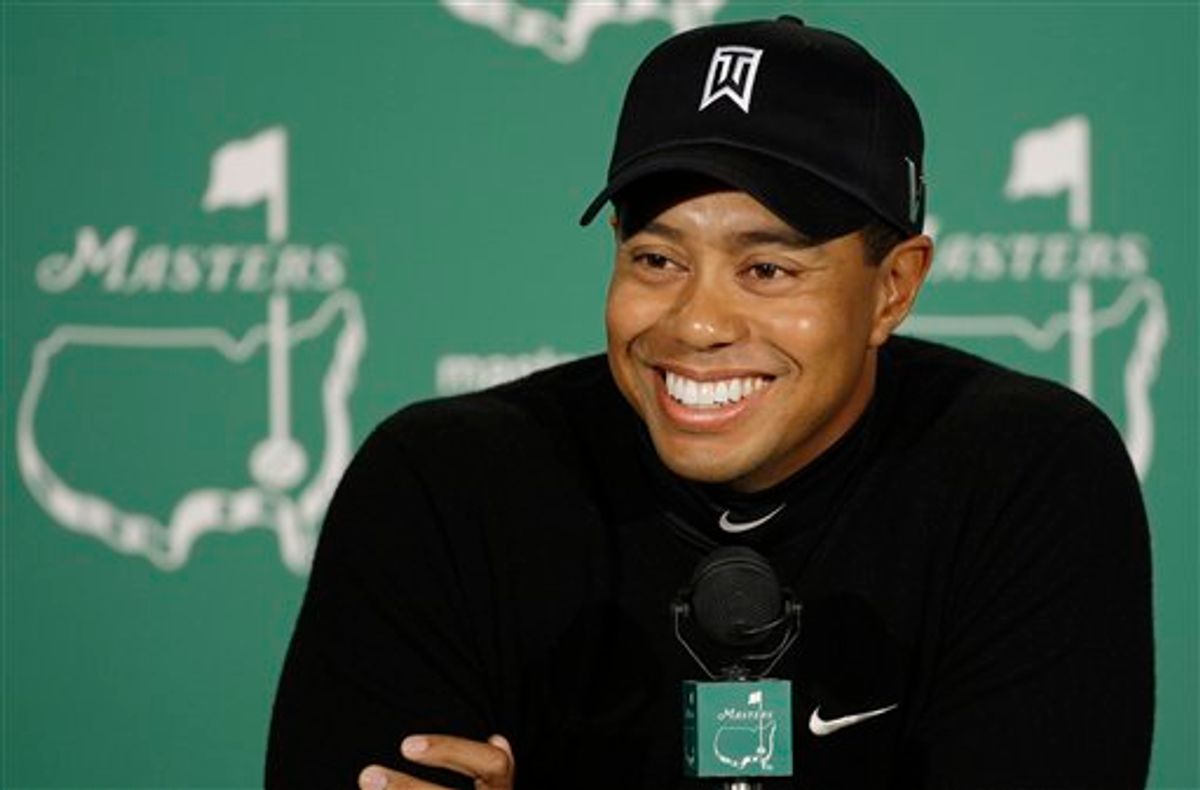 FILE - This April 7, 2009, file photo shows Tiger Woods speaking to the media during a news conference at the Masters golf tournament at the Augusta National Golf Club in Augusta, Ga.  (AP Photo/Chris O'Meara, File) (AP)