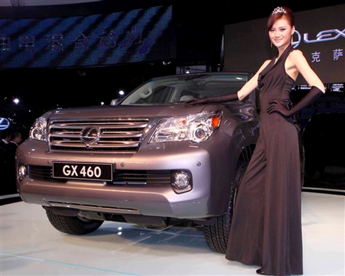 FILE -- In a Nov. 23, 2009 file photo released by the Xinhua news agency, a model presents a Lexus GX460 car during the 7th China International Automobile Exhibition in Guangzhou, Guangdong province, China.  Consumer Reports has given the Lexus GX460 a rare "Don't Buy" warning, saying a problem that occurred during routine handling tests could lead the SUV to roll over in real-world driving. (AP Photo/Xinhua, Chen Jianli/file)  ** NO SALES **  (AP)