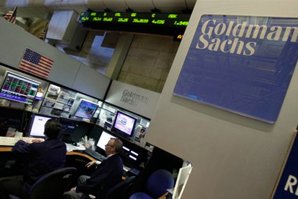 Traders work in the Goldman Sachs booth on the floor of the New York Stock Exchange on  April 19.