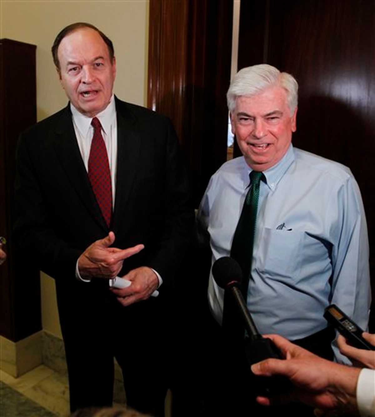 Senate Banking Committee Chairman Christopher Dodd, D-Conn., right, and the committee's ranking Republican Sen. Richard Shelby, R-Ala., emerge from a meeting on Capitol Hill in Washington, Monday, April 26, 2010, ahead of a crucial test vote for the financial reform bill. (AP Photo/Charles Dharapak) (AP)