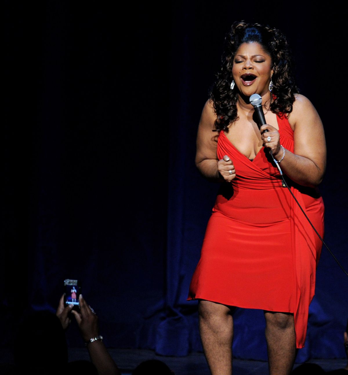 Actress/comedienne Mo'Nique performs during her "Spread The Love" comedy tour at the Nokia Theater on April 2, 2010 in Los Angeles, California. (Kevin Winter)