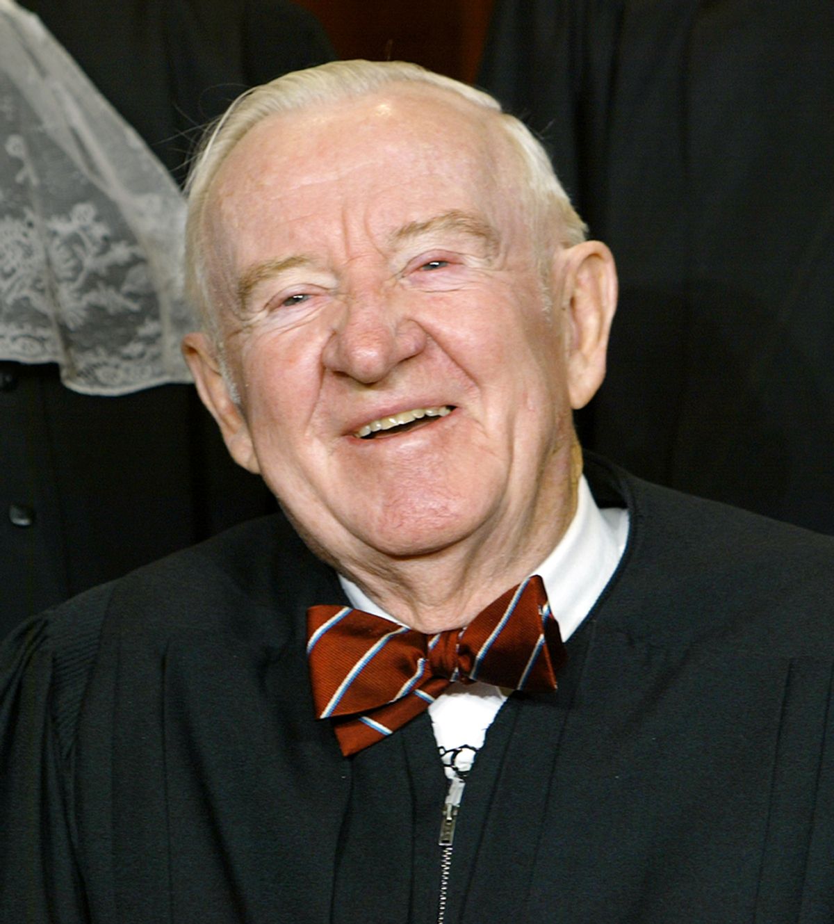 Supreme Court Associate Justice John Paul Stevens poses for photos during a group portrait session with the members of the U.S. Supreme Court, at the Supreme Court Building  in Washington, Friday, Dec. 05, 2003. President Ford nominated Stevens to the Supreme Court, taking his seat Dec. 19, 1975. (AP Photo/J. Scott Applewhite) (J. Scott Applewhite)