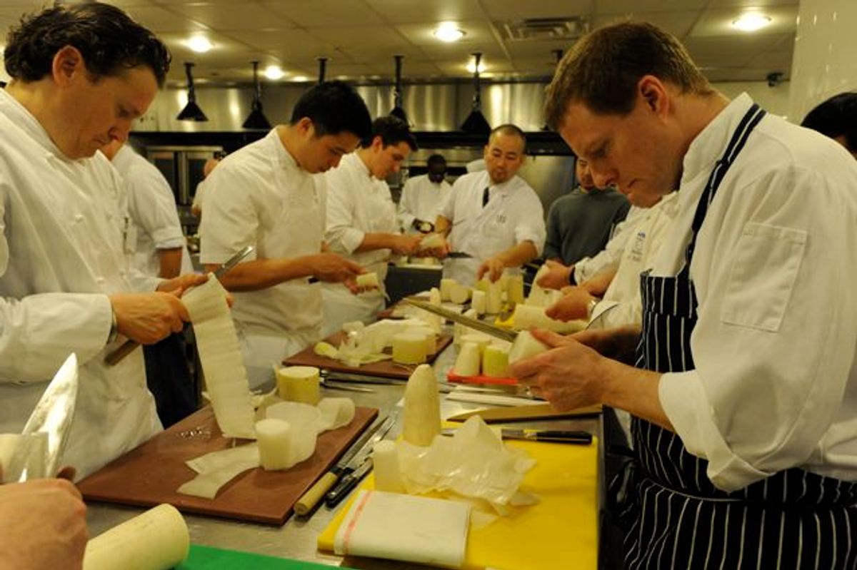 Eddy Leroux (left) and other chefs "unrolling" their daikons
