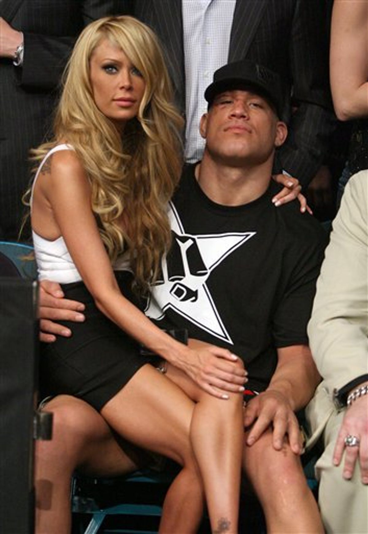 FILE - In this May 24, 2008 file photo, mixed martial arts star Tito Ortiz, right, is seen with Jenna Jameson after his fight at UFC 84 at the MGM Grand Garden Arena in Las Vegas. Ortiz was arrested on suspicion of domestic violence Monday, April 26, 2010, at the home he shares with Jameson. (AP Photo/Eric Jamison, File) (AP)