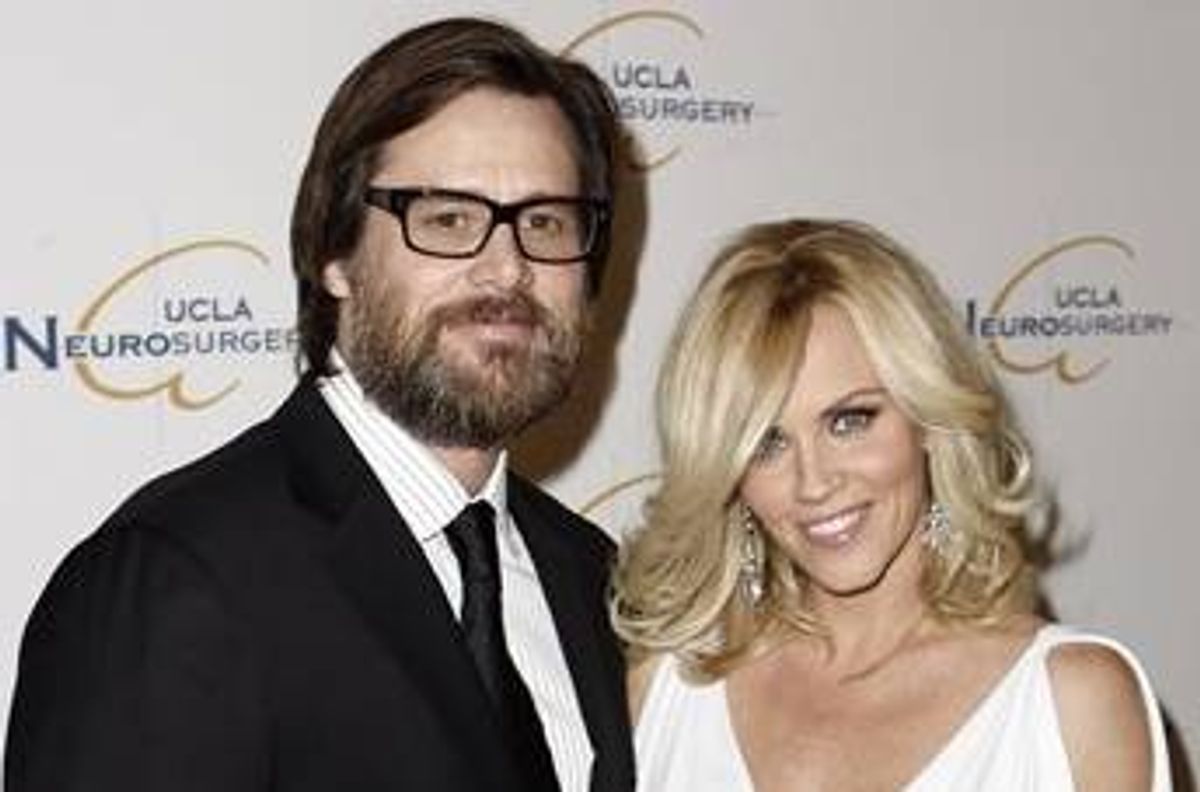 FILE - In this Oct. 1, 2009 file photo, Jim Carrey, left, and Jenny McCarthy arrive at the UCLA Department of Neurosurgery 2009 Visionary Ball in Beverly Hills, Calif.  (AP Photo/Matt Sayles, file)        (AP)