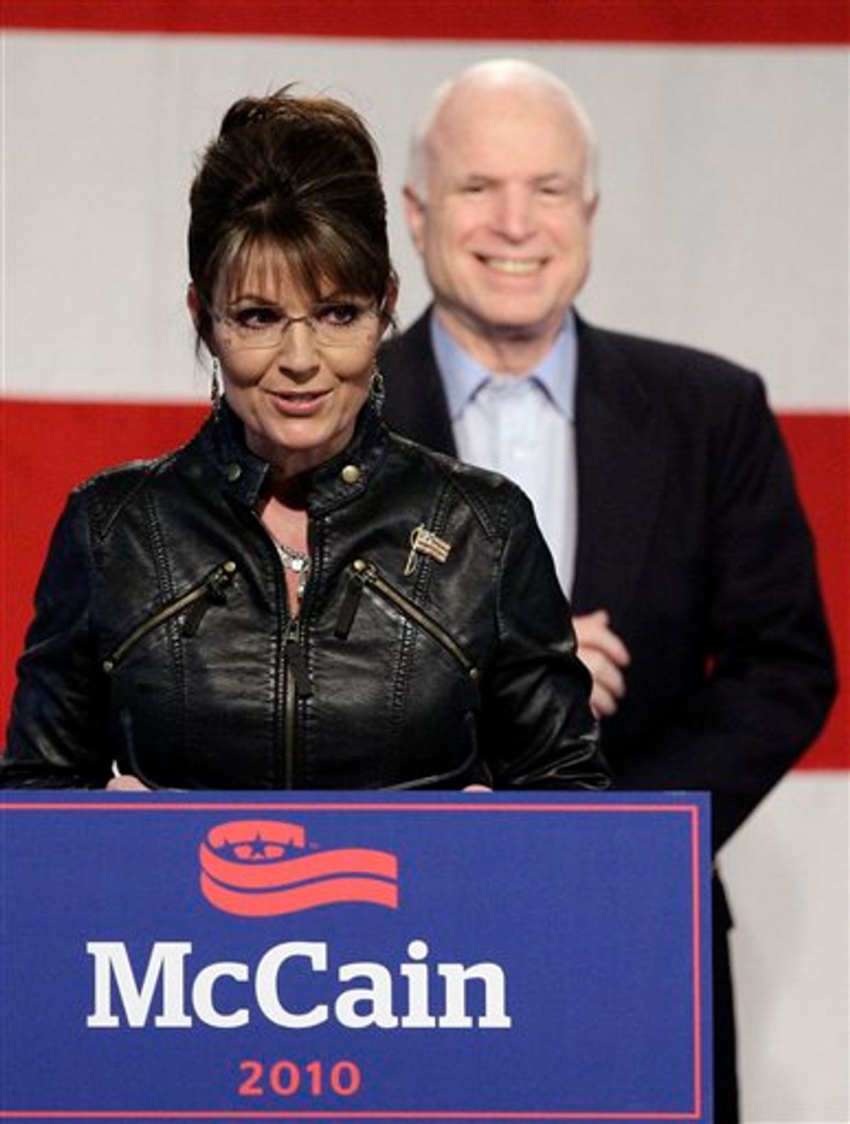 FILE - In this Friday, March 26, 2010  file photo, Sarah Palin, left, talks at a campaign rally for Sen. John McCain, back, at the Pima County Fairgrounds in Tucson, Ariz. Sarah Palin and thousands of tea party activists plan to descend on Sen. Harry Reid's hometown in the Nevada desert Saturday to call for the ouster of Democrats who supported the health care overhaul. (AP Photo/Ross D. Franklin, File) (AP)