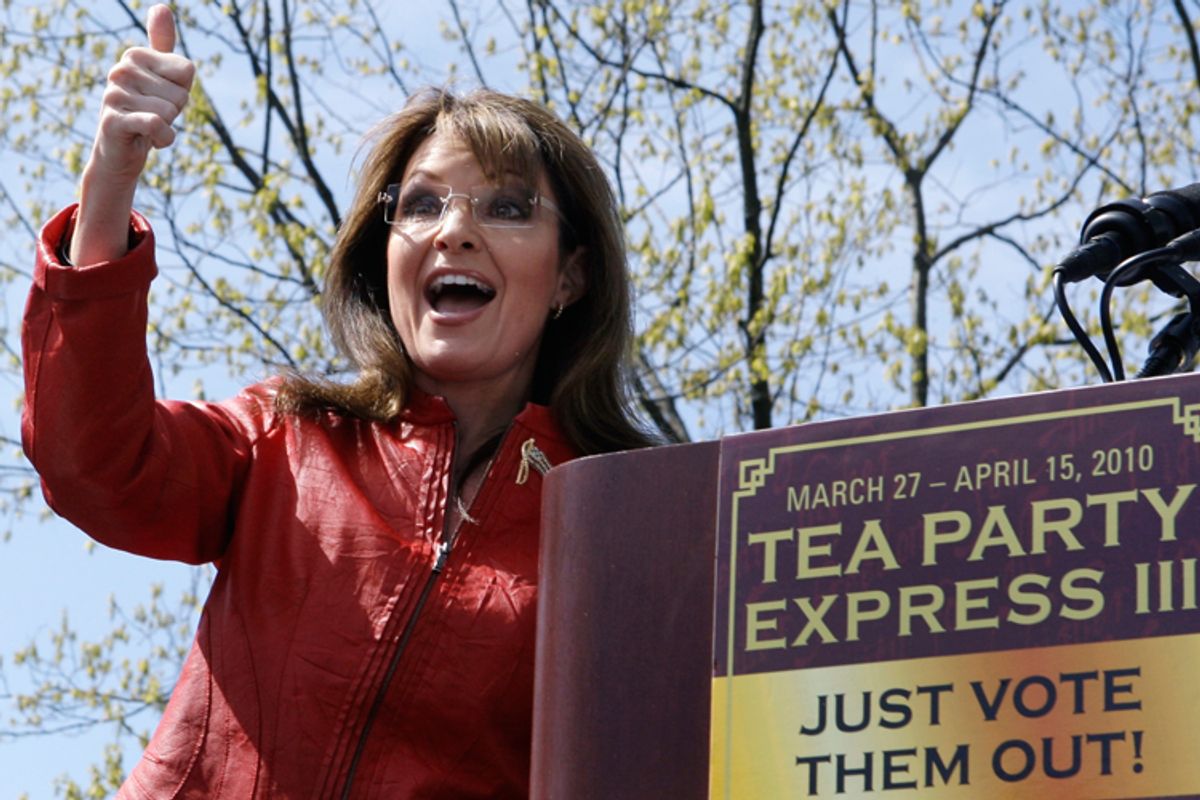 Sarah Palin gives a thumbs up to the crowd following her address during a stop of the Tea Party Express in Boston. 