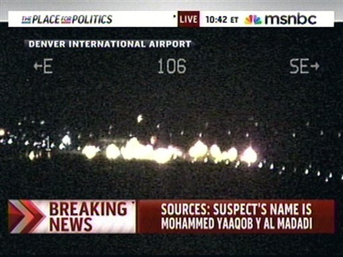 In this image taken from MSNBC video on Wednesday April 7, 2010, shows authorities responding to a plane disturbance on United Flight 663 at the Denver International Airport. The FBI is probing whether a man tried to ignite his shoes on a DC to Denver flight Wednesday, according to law enforcement officials, who say the man is a Qatari diplomat.  (AP Photo/MSNBC) (AP)