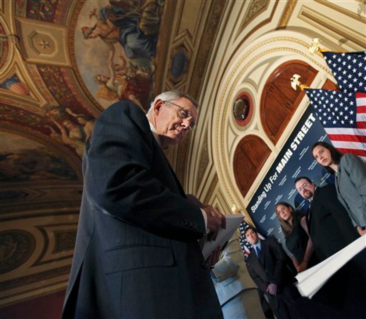 Senate Majority Leader Harry Reid of Nev., looks at signed petition papers on a table in support of a strong financial reform, during a news conference discussing Wall Street accountability legislation, Wednesday, May 5, 2010, on Capitol Hill in Washington.   (AP Photo/Manuel Balce Ceneta) (AP)