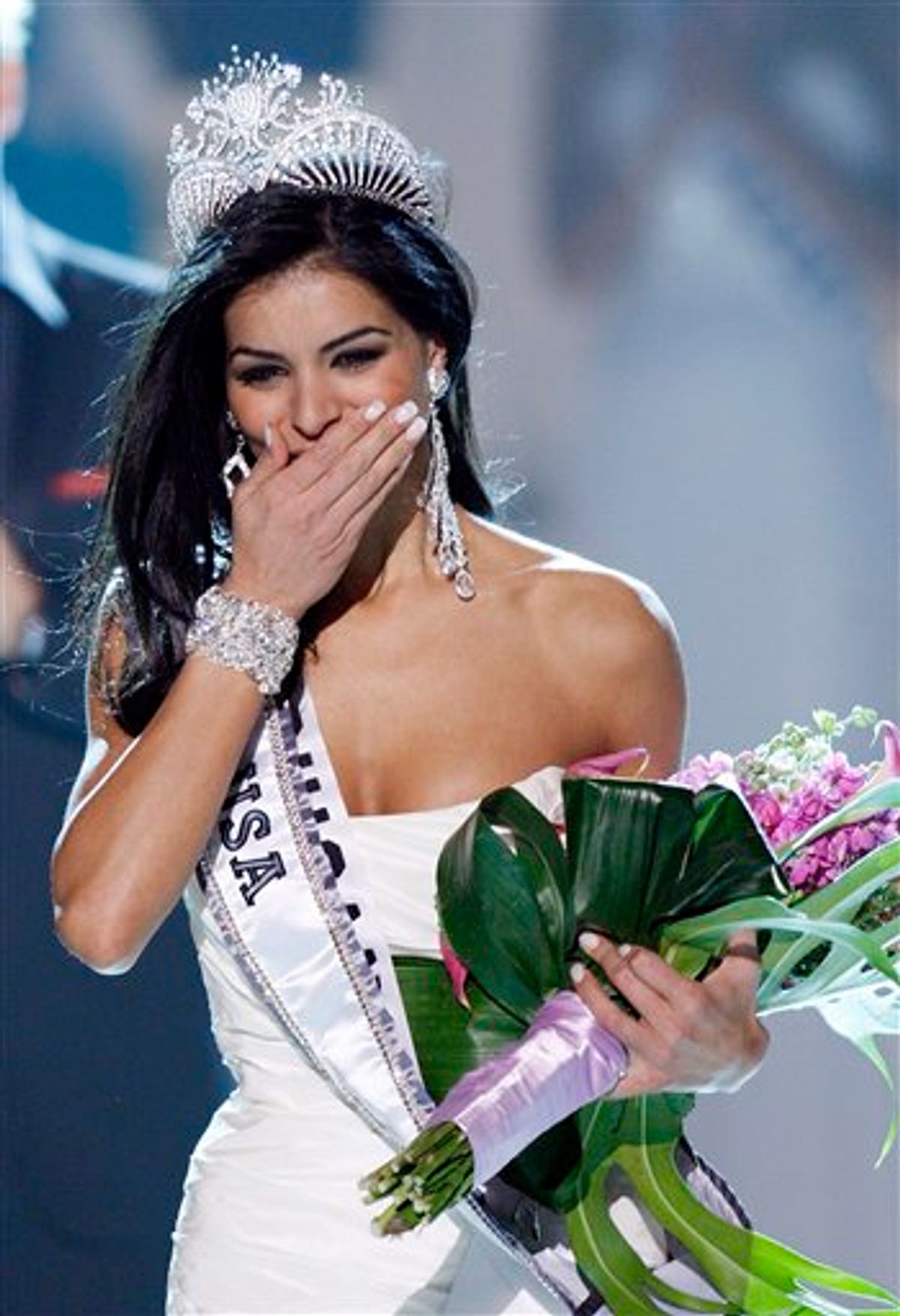 Miss Michigan Rima Fakih reacts as she is crowned Miss USA 2010 Sunday, May 16, 2010 in Las Vegas. (AP Photo/Isaac Brekken) (AP)