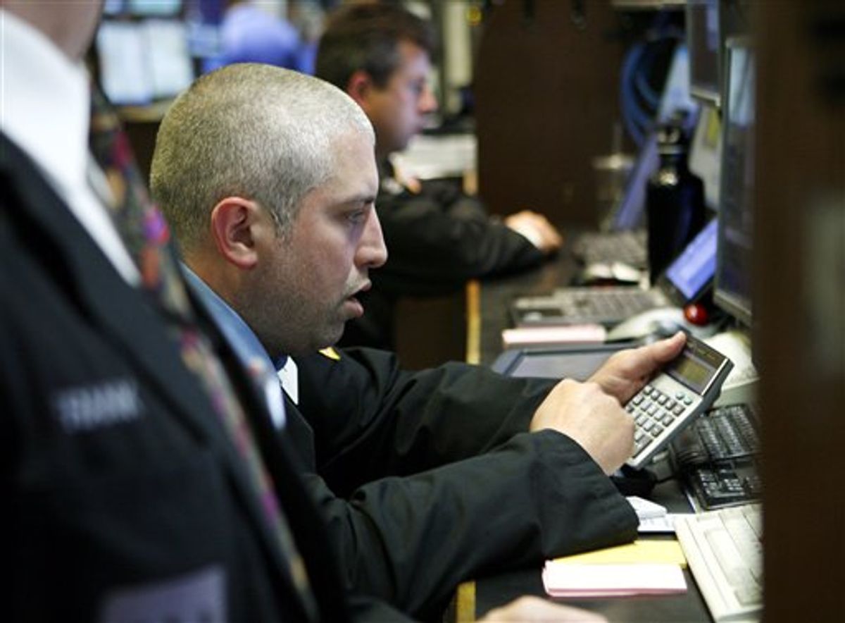 A broker works the numbers at his post on the trading floor of the New York Stock Exchange Tuesday, May 4, 2010, in New York. Stocks plunged around the world Tuesday as fears spread that Europe's attempt to contain Greece's debt crisis would fail. (AP Photo/David Karp) (AP)
