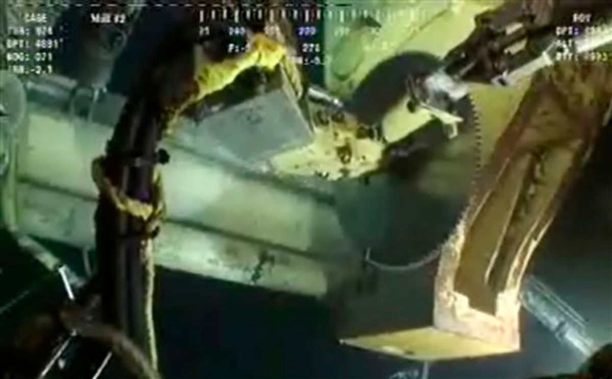 This image made from video released by British Petroleum (BP PLC), equipment is seen on the live feed from the Deepwater Horizon oil rig Tuesday, June 1, 2010. BP has turned to another temporary fix, an effort to saw through the pipe leaking the oil and cap it that could be tried as soon as Wednesday. (AP Photo/BP PLC) (AP)