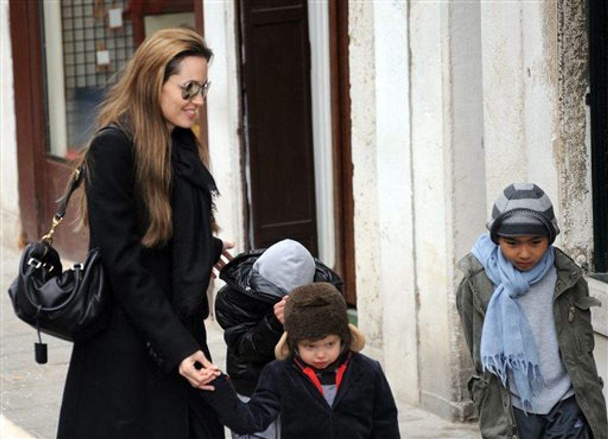 Angelina Jolie walks with her children Maddox, right and Shiloh Nouvel, in Venice, Italy, Tuesday, Feb. 16, 2010. Jolie is in Venice to shoot scenes of the movie "The Tourist", by director Florian Henckel von Donnersmarck. (AP Photo/Luigi Costantini) (Associated Press)