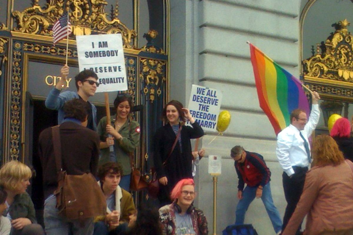 Opponents of Proposition 8 gather outside San Francisco City Hall after the news broke that the law had been struck down. 