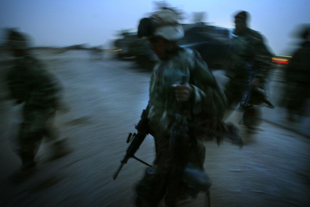 U.S. marines run with their combat gear to take position in the suburbs of
the town of Nasariyah in Iraq March 24, 2003. U.S. marines were fighting on
Monday to take control of Nassiriya where the city's defenders were putting
up stout resistance. REUTERS/Damir Sagolj    Pictures of the month March
2003

DS/FMS   (Â© Reuters Photographer / Reuters)