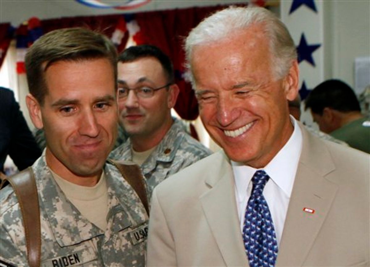 In this July 4, 2009 photo, U.S. Vice President Joe Biden, right, is seen with his son, U.S. Army Capt. Beau Biden, at Camp Victory on the outskirts of Baghdad, Iraq. Vice President Joe Biden's son was being treated at a Delaware hospital, the White House said Tuesday, though it did not provide information about what might be wrong. Delaware Attorney General Beau Biden was awake and alert and communicating with his parents and wife, who were with him at Christiana Hospital in Newark. (AP Photo/Khalid Mohammed)   (AP)