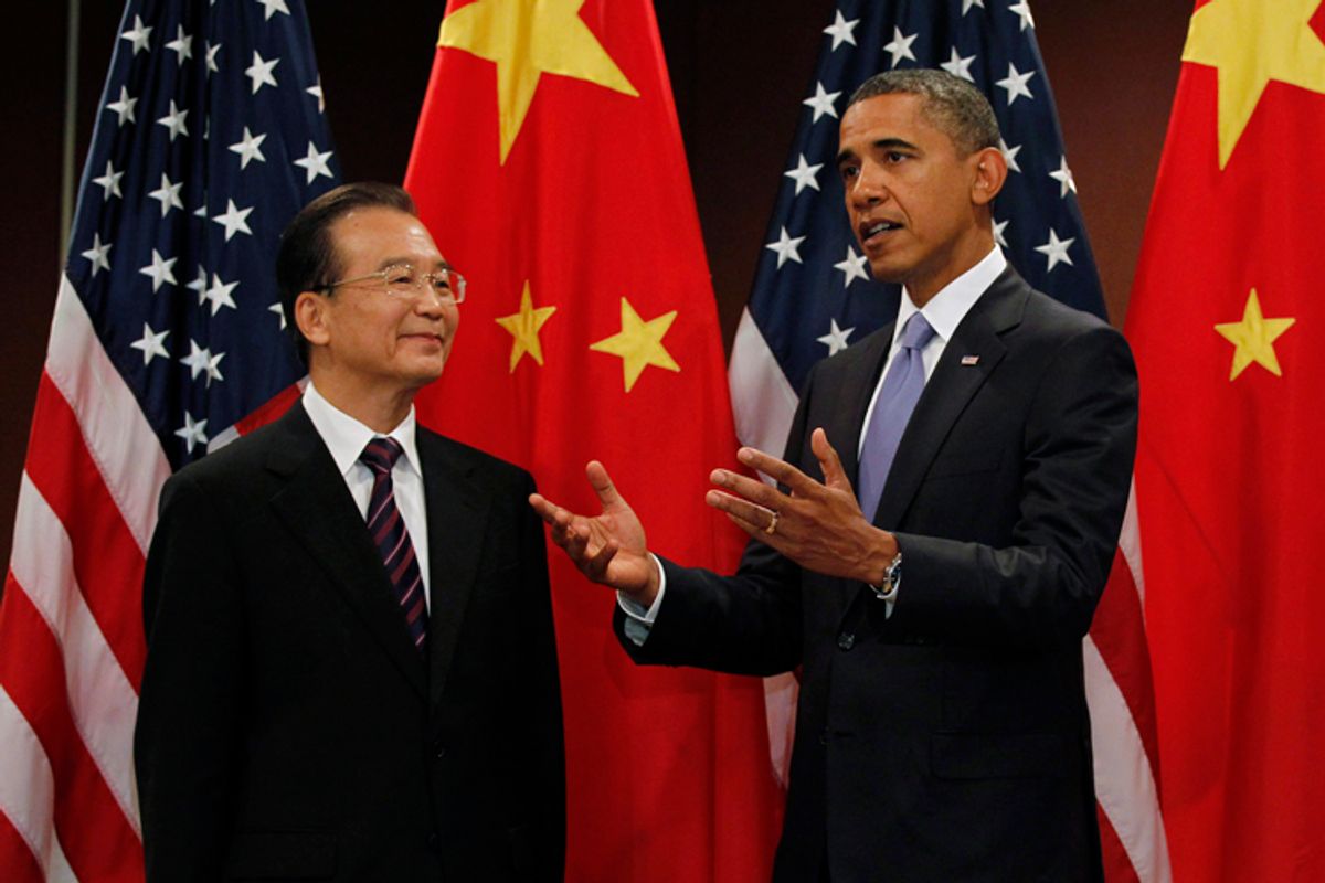 U.S. President Barack Obama gestures alongside China's Premier Wen Jiabao before their bilateral meeting at the United Nations in New York, September 23, 2010.    REUTERS/Jason Reed  (UNITED STATES - Tags: POLITICS)   (Â© Jason Reed / Reuters)