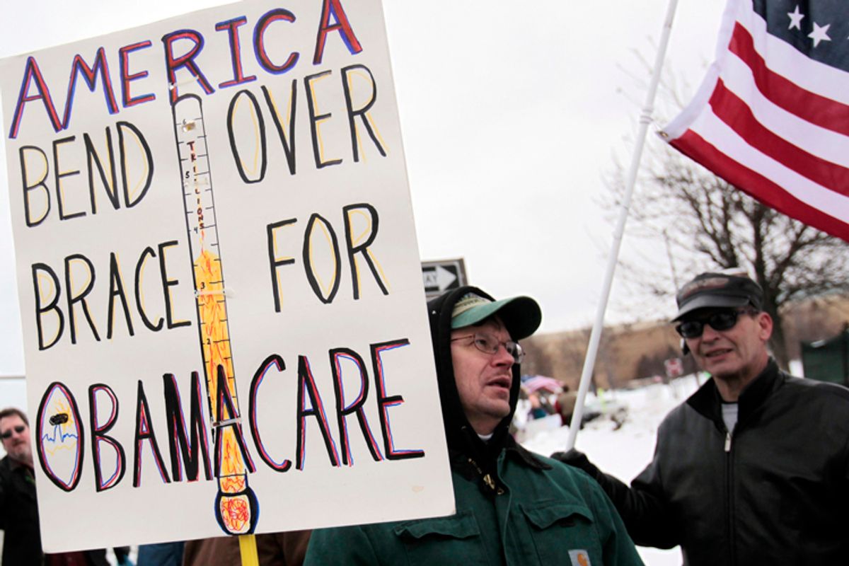 A Tea Party member carries a sign voicing his concern over "ObamaCare" during a rally marking the one-year anniversary of the movement in Troy, Michigan February 27, 2010. Some Tea Partiers say they can pinpoint the precise moment when they made it clear to the Republican Party they had no intention of being its lapdog. On a bright, brisk afternoon in mid-February, with snow still thick on the ground from storms that had battered Washington the week before, Republican National Committee Chairman Michael Steele met with more than 50 members of the Tea Party, the Twitter Age conservative movement that is reshaping the U.S. political landscape. Picture taken February 27, 2010. To match Special Report USA-POLITICS/TEAPARTY. REUTERS/Rebecca Cook  (UNITED STATES - Tags: POLITICS CIVIL UNREST)  (Â© Rebecca Cook / Reuters)