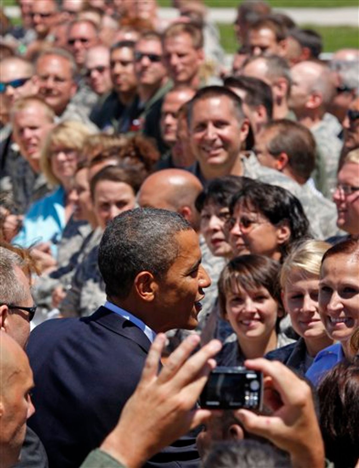 FILE - In this June 30, 2010 file photo, President Barack Obama greets members of the Wisconsin National Guards 128th Air Refueling Wing upon his arrival at Mitchell International airport in Milwaukee, Wis. When President Barack Obama makes his third Wisconsin visit in a little over two months Monday, he will get a chance to shore up his base at a Labor Day rally in a state where his approval ratings are dipping and fellow Democrats face tough re-election bids.  (AP Photo/Jeffrey Phelps, File) (AP)