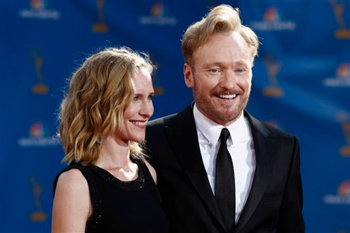 Conan O'Brien and wife Liza Powel arrive for the 62nd Primetime Emmy Awards Sunday, Aug. 29, 2010, in Los Angeles. (AP Photo/Matt Sayles) (AP)