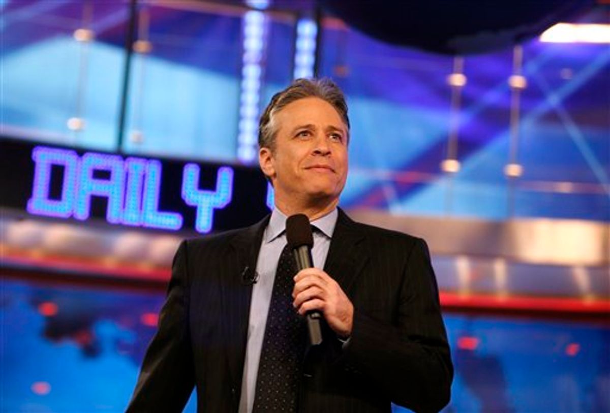 FILE - In this March 12, 2009 file photo, Jon Stewart is shown during a taping of Comedy Central's "The Daily Show with Jon Stewart" in New York.  (AP Photo/Jason DeCrow, file) (AP)