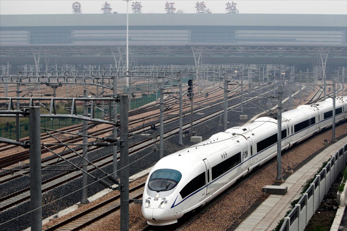 A high-speed train travels on the newly built Shanghai-Nanjing railway in Shanghai.
