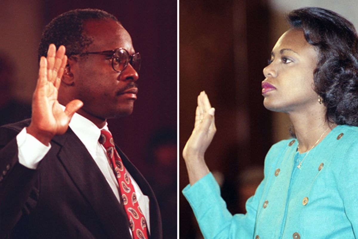 Judge Clarence Thomas, left, and Anita Hill are sworn in before testifying to the Senate judiciary Committee on Capitol Hill, Oct. 1991