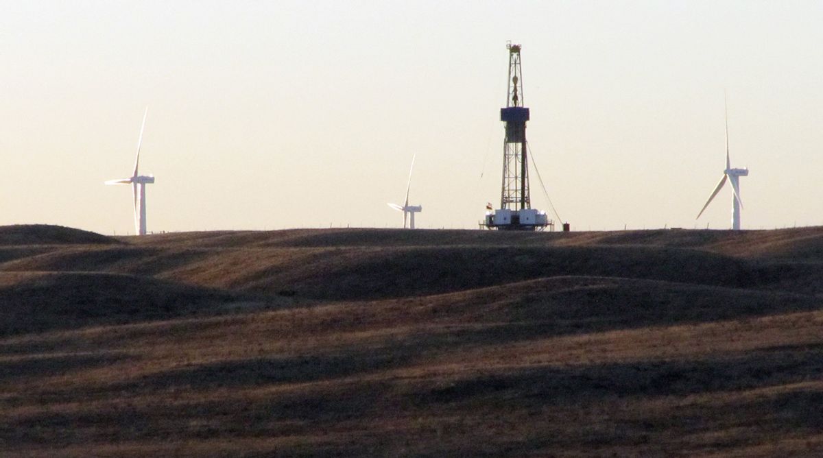 A rig drilling an oil well for QEP Resources Inc., is shown on ranchland a few miles west of Cheyenne, Wyo., Thursday Sept. 30, 2010. More oil rigs are popping up around Cheyenne and some new wells 50 miles north of town might already be producing oil from the Niobrara Shale. The Wyoming Oil and Gas Conservation Commission has issued permits for more than 50 oil wells in northern Laramie County and southern Goshen and Platte counties so far this year. Dozens of those wells are now marked "confidential" on the production information page on the commission website.   (AP Photo/Mead Gruver) (Mead Gruver)