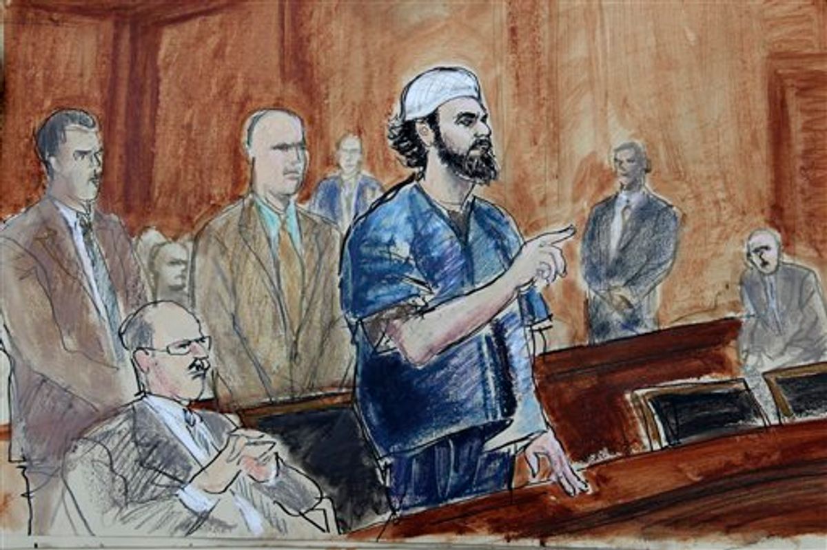 This courtroom sketch made Tuesday, Oct. 5, 2010 shows Faisal Shahzad, center, surrounded by U.S. Marshals and accompanied by his attorney Philip Weinstein, left, during his sentencing in Manhattan Federal court in New York. The Pakistani immigrant who tried to set off a car bomb in Times Square in May 2010 was sentenced Tuesday to life in prison. (AP Photo/Elizabeth Williams) (AP)