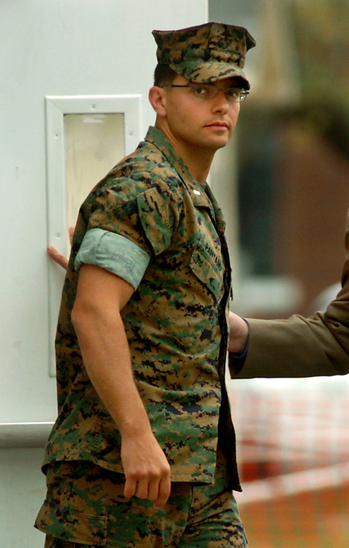 U.S. Marine Second Lt. Ilario Pantano exits the Legal Support Service Courtroom for a recess during his second day of his Artical 32 hearing Wednesday, April 27, 2005, in Camp Lejeune, N.C. Pantano, 33, is accused of murder for shooting two Iraqis in the back during a search for a terrorist hideout last year. (AP photo/Sara D. Davis) (Sara D.  Davis)