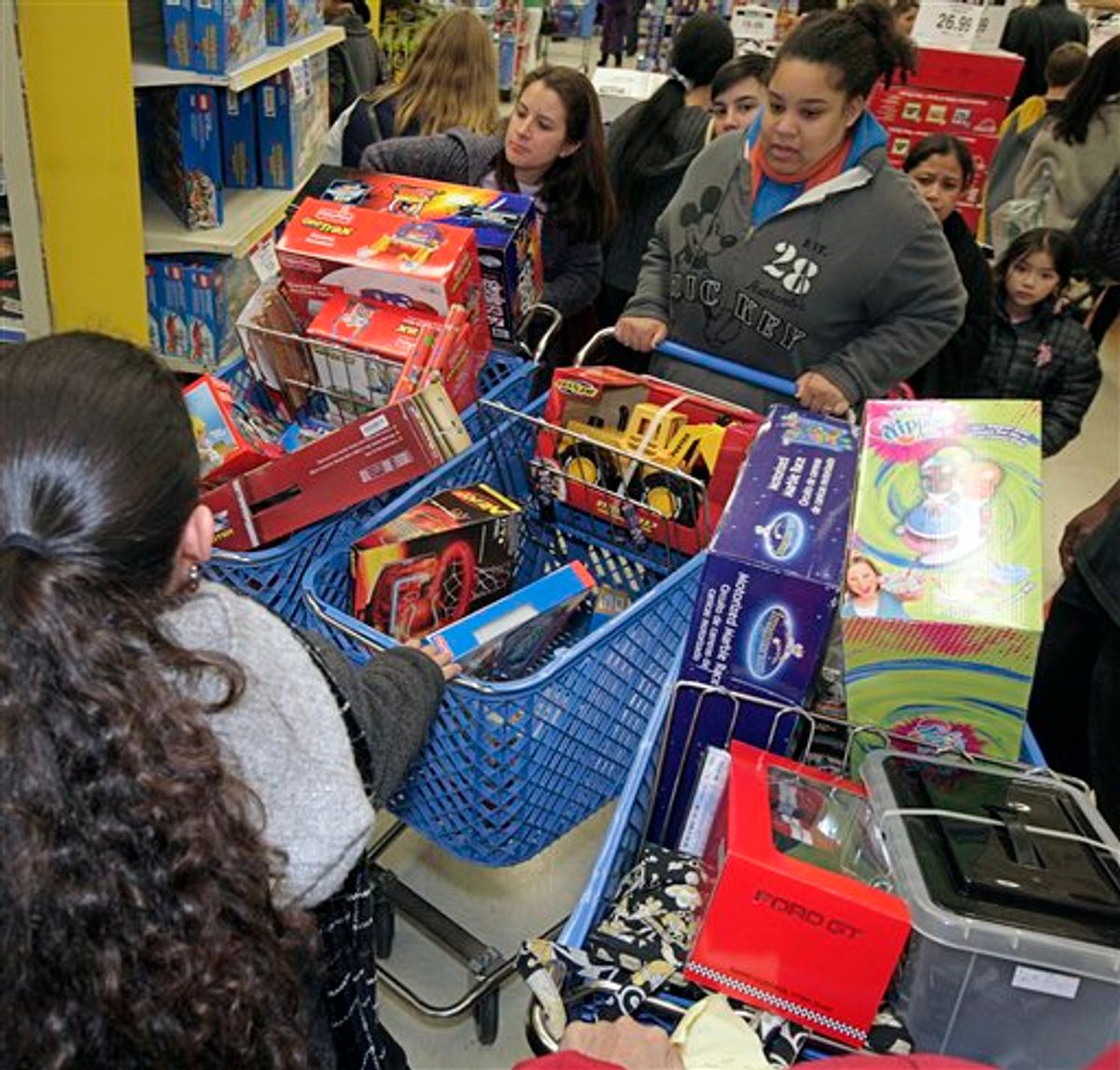 A traffic jam is negotiated in the aisles of Toys R Us, in San Rafael Calif., Thursday Nov. 25, 2010 which was crowed with Black Friday shoppers. (AP Photo/Mike Adaskaveg)   (AP)