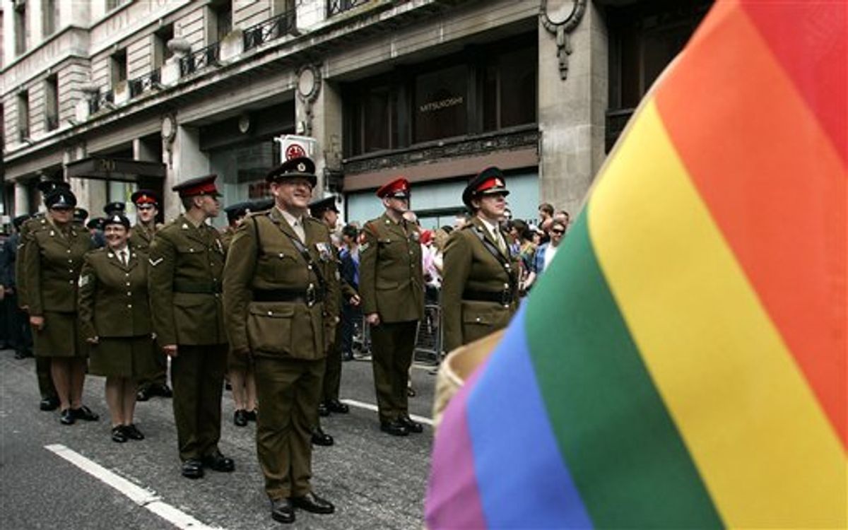 FILE - In this July 4, 2009 file photo, military personnel join the march during an annual gay pride parade in central London organized by Pride London, the lesbian, gay, bisexual, and transgender charity. Most of America's closest allies opted years ago to allow gays to serve openly in their militaries. As U.S. policymakers wrestle with the issue, there's sharp disagreement over whether those allies' experiences are relevant to the debate. (AP Photo/Akira Suemori, File) (AP)
