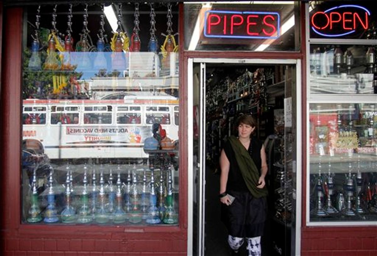 Smoking paraphernalia is displayed on a storefront as Californians decide to vote for the legalization of marijuana in San Francisco, Tuesday, Nov. 2, 2010.(AP Photo/Marcio Jose Sanchez) (AP)