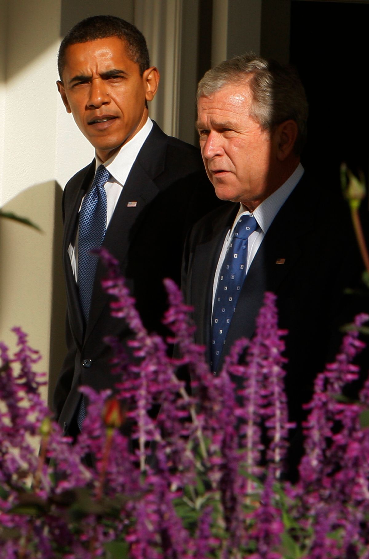 President Bush and President-elect Obama walk along the West Wing Colonnade of the White House in Washington, Monday, Nov. 10, 2008 prior to their meeting in the Oval Office. (AP Photo/Charles Dharapak) (Associated Press)