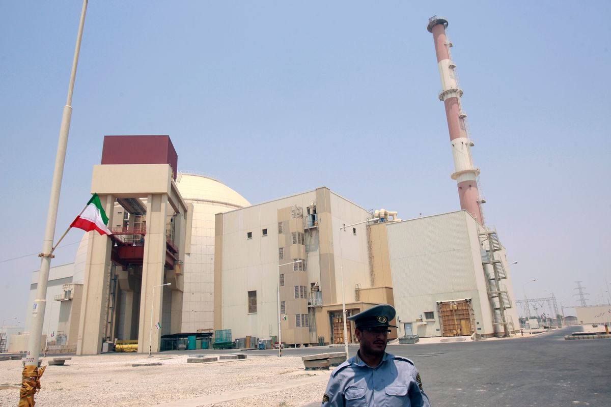 EDITORS' NOTE: Reuters and other foreign media are subject to Iranian restrictions on leaving the office to report, film or take pictures in Tehran.

A security official stands in front of the Bushehr nuclear reactor, 1,200 km (746 miles) south of Tehran, August 21, 2010. Iran began fuelling its first nuclear power plant on Saturday, a potent symbol of its growing regional sway and rejection of international sanctions designed to prevent it building a nuclear bomb.  REUTERS/Raheb Homavandi (IRAN - Tags: POLITICS ENERGY) (Reuters)
