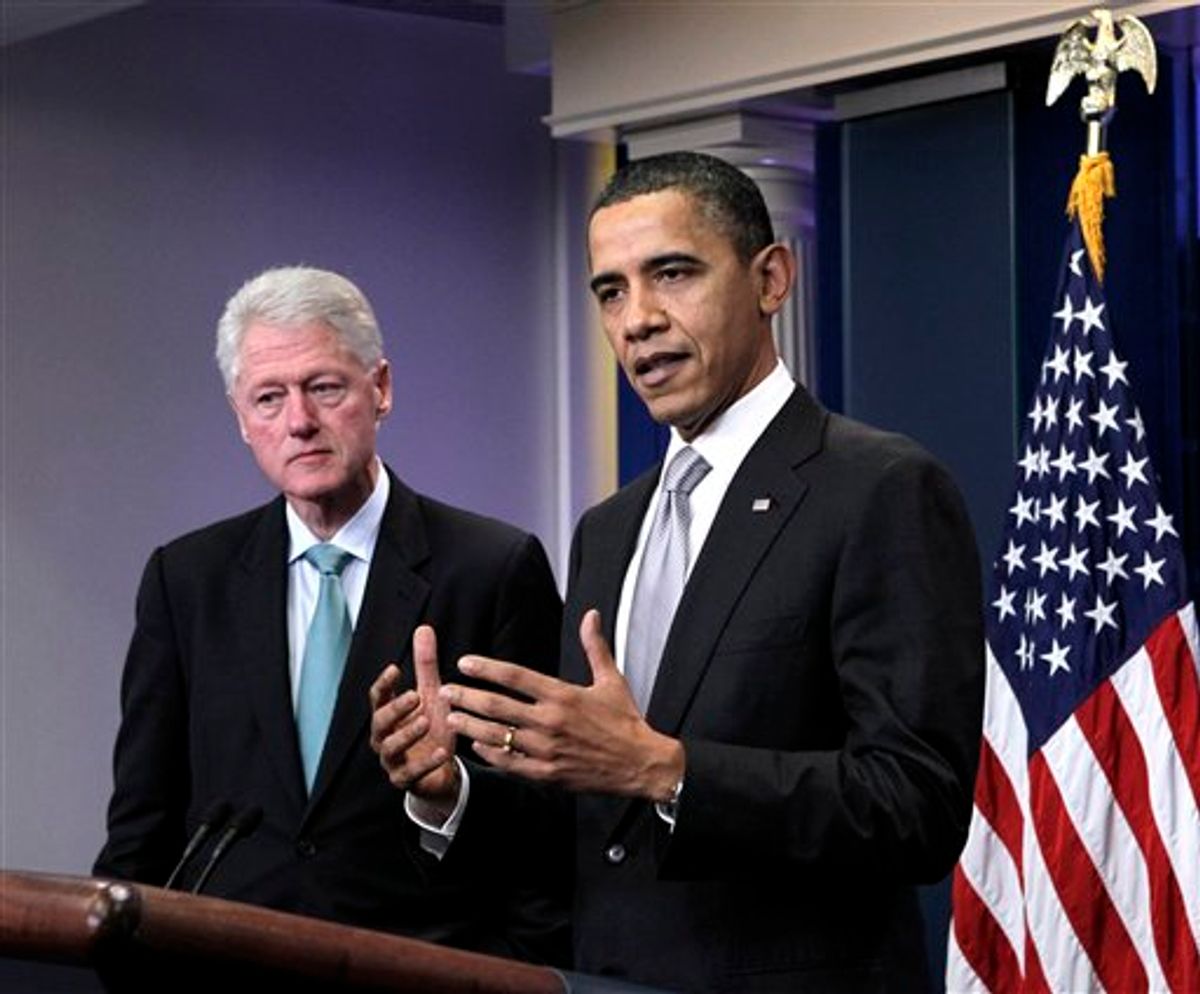 President Barack Obama, accompanied by former President Bill Clinton, speaks briefly in the briefing room of the White House in Washington, Friday, Dec. 10, 2010, before giving the microphone to Clinton, where he talked about Obama's urging of the Congress to move on the tax compromise he made with Republican congressional leaders. (AP Photo/J. Scott Applewhite) (AP)
