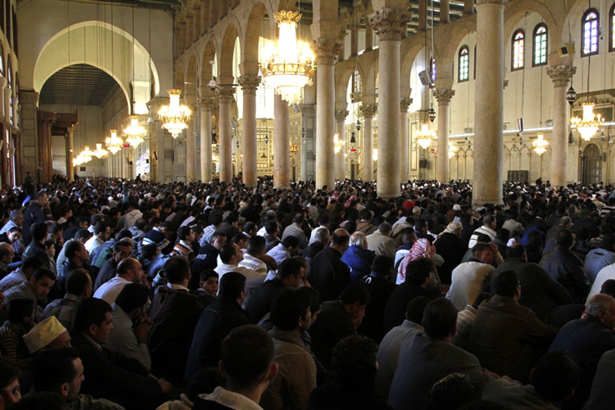 Muslims pray for rain after Friday prayers in Damascus on Dec. 10.