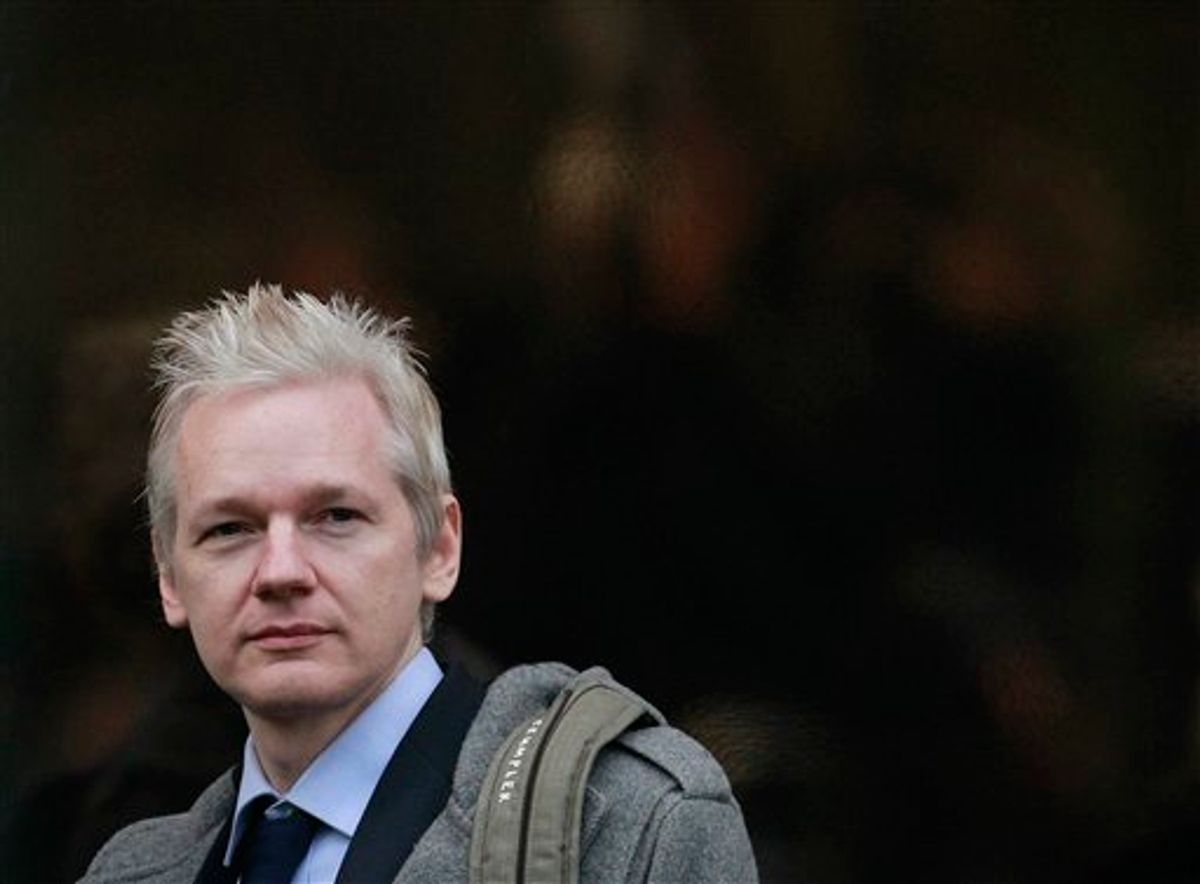 WikiLeaks founder Julian Assange arrives at Belmarsh Magistrate's court in London for his extradition hearing, Tuesday, Jan. 11, 2011. (AP Photo/Matt Dunham) (AP)