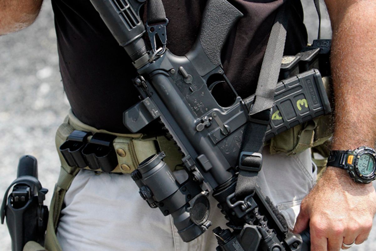 A firearms and tactics instructor at Blackwater Worldwide is armed for a training exercise in Moyock, N.C. 