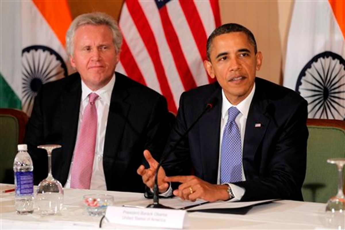 FILE - In this Nov. 6, 2010 file photo, General Electric's Jeffrey Immelt, looks on as President Barack Obama speaks at a roundtable discussion with business leaders in Mumbai, India. President Barack Obama is restructuring his economic advisory board and naming Immelt as it new head. (AP Photo/Charles Dharapak, File) (AP)
