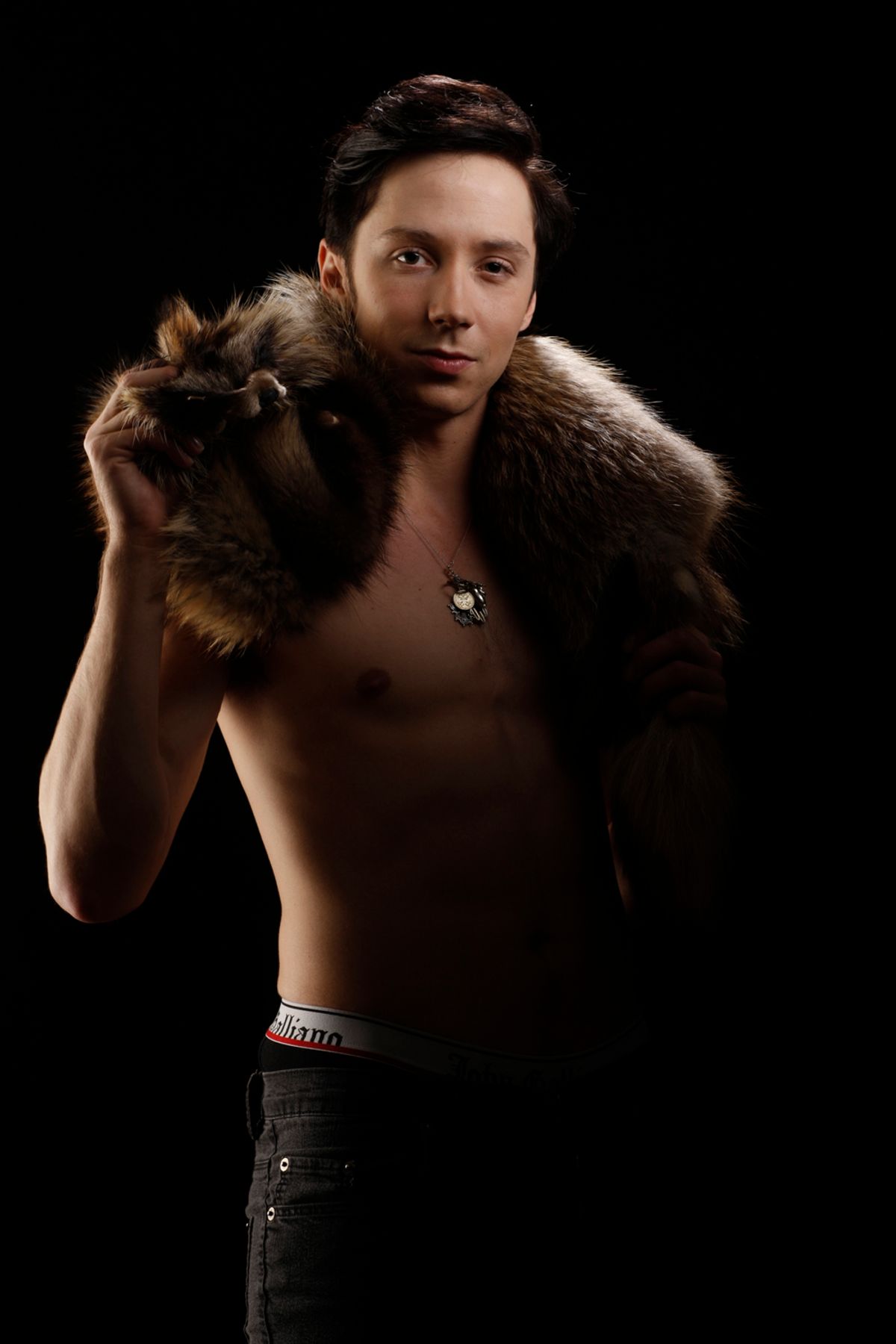 Men's figure skater Johnny Weir poses with a fox pelt during the 2010 U.S. Olympic Team Media Summit in Chicago, September 11, 2009. REUTERS/John Gress (UNITED STATES SPORT OLYMPICS FIGURE SKATING) (Â© John Gress / Reuters)