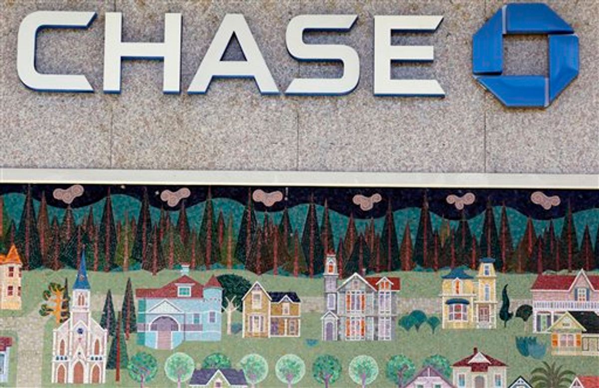 In this photo taken Jan. 5, 2011, a mural of a small town is shown at Chase bank in Santa Cruz, Calif. JPMorgan Chase & Co. (NYSE: JPM) today reported fourth-quarter 2010 net income of $4.8 billion, an increase of 47% compared with $3.3 billion for the fourth quarter of 2009.  (AP Photo/Paul Sakuma)   (AP)