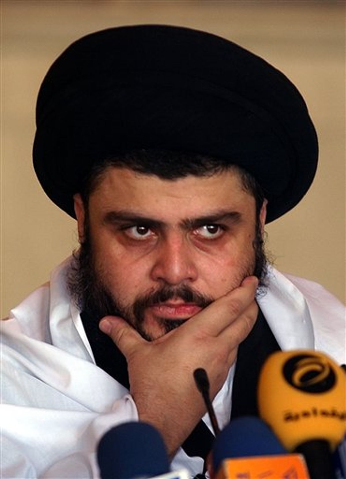FILE - In this Sept. 22, 2006 file photo, Radical Shiite cleric Muqtada al-Sadr delivers a Friday sermon, in a Mosque, in Kufa, Iraq. Iraqi officials said Wednesday Jan. 5, 2011  al-Sadr returned to Iraq after a nearly 3-year absence.(AP Photo/Alaa Al-Marjani, File) (AP)