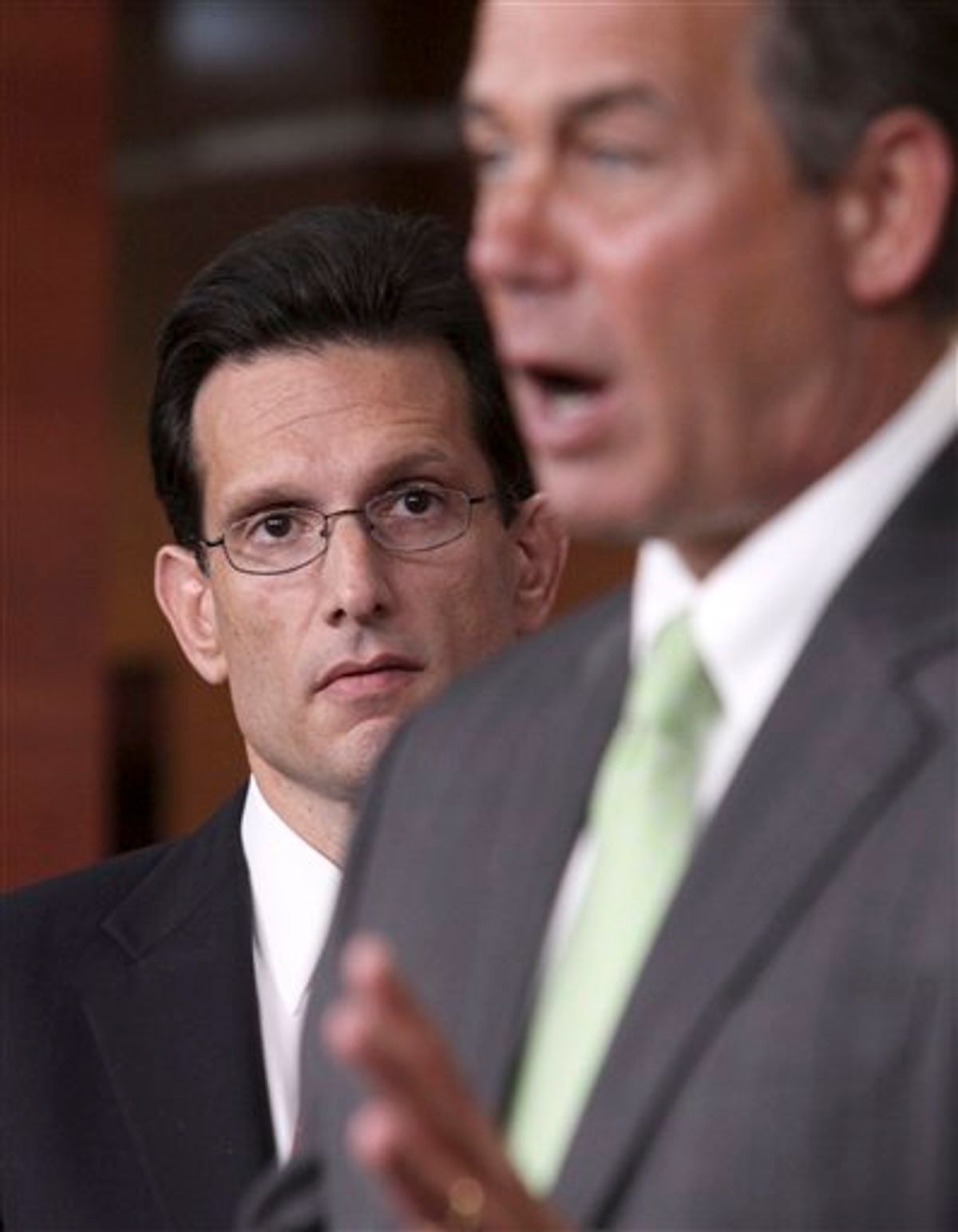 FILE - In this Jan. 20, 2010 file photo, House Minority Whip Eric Cantor of Va., left, listens As House Minority Leader John Boehner of Ohio speaks during a news conference on Capitol Hill in Washington. Republican leaders, ever more confident of their chances of winning control of the House and possibly the Senate, have begun plotting a 2011 agenda topped by a push for eye-popping spending cuts and attempts to undo key parts of President Barack Obama's health care and financial regulation laws.  (AP Photo/Lauren Victoria Burke, File)  (AP)